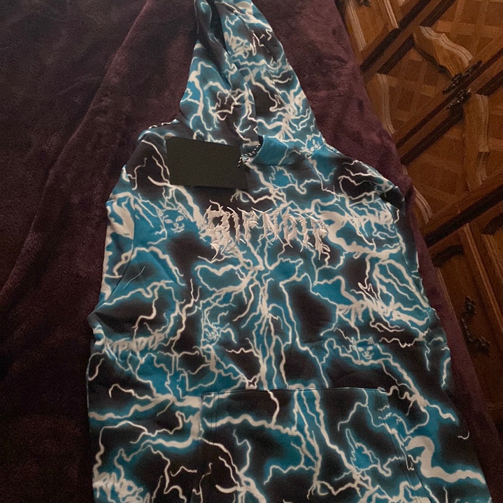 Rip and dip, blue and black sweater size medium unworn